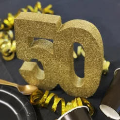 Guldglittrig bordsdekoration 50 år